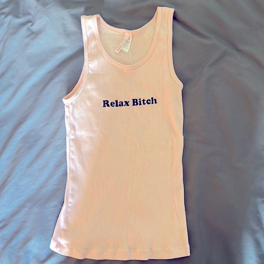 Pink tank top “Relax B*tch” on front, “He’s not my type” on back